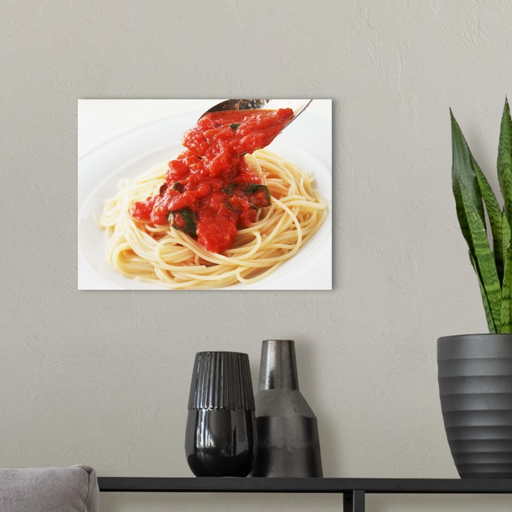 A modern room featuring Spaghetti Pomodoro