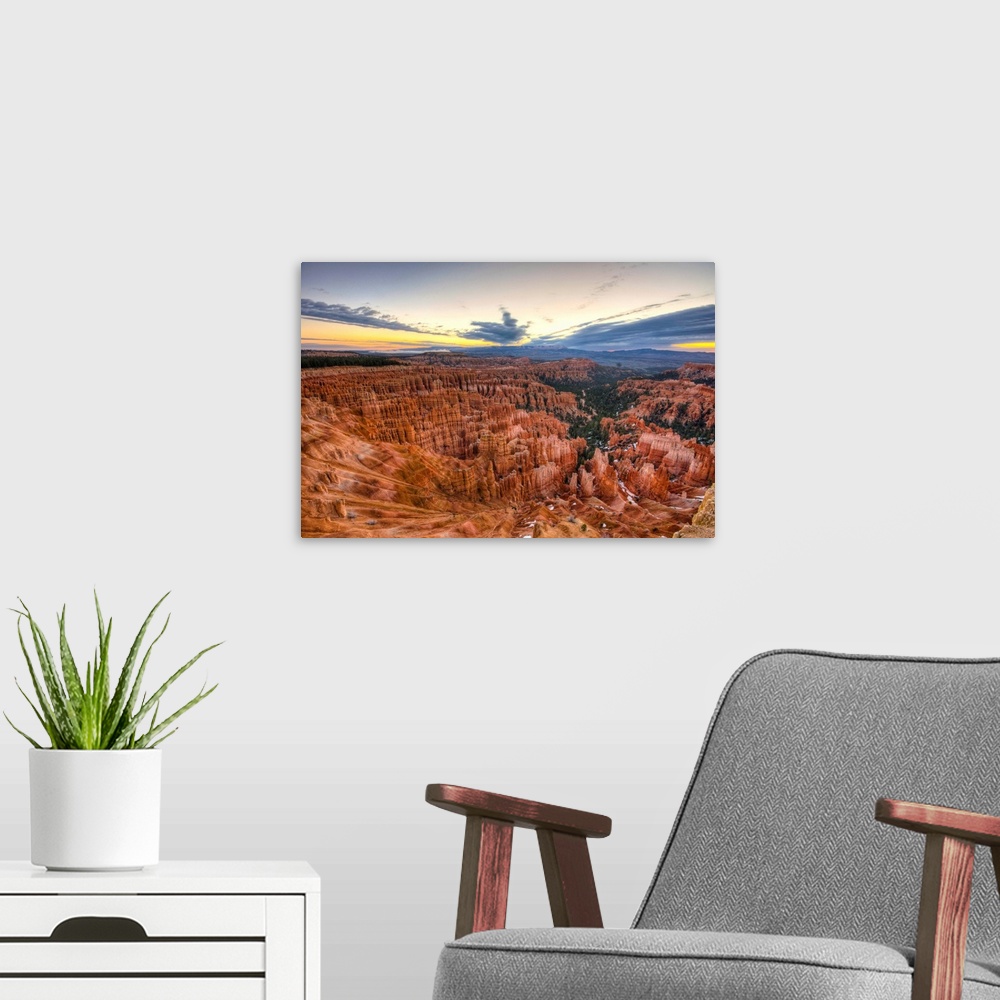 A modern room featuring A moody sunrise at Inspiration Point in Bryce Canyon National Park still manages to reveal the de...