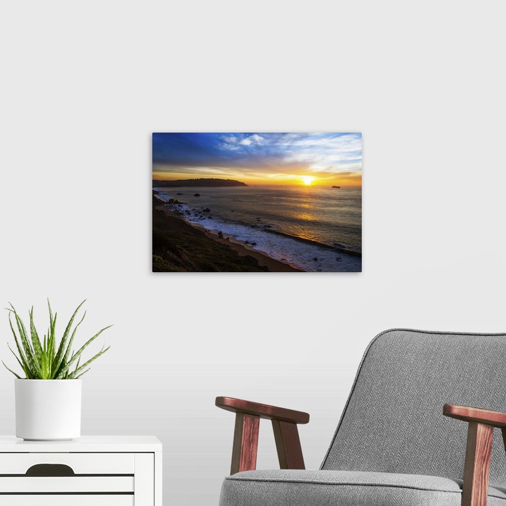 A modern room featuring Sunset at San Francisco Bay, America, United States, coastline.