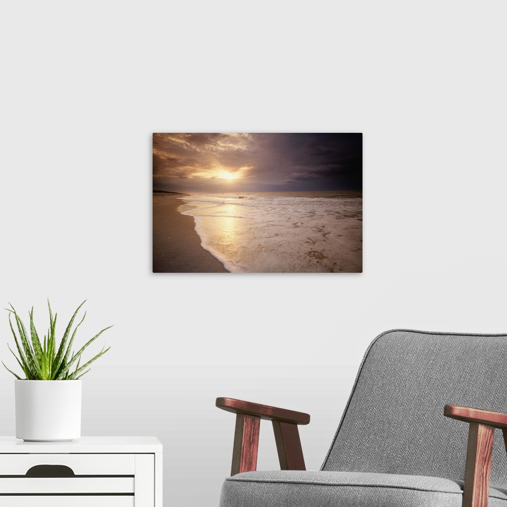 A modern room featuring Sunset on the beach of the Gulf of Mexico, Florida, USA