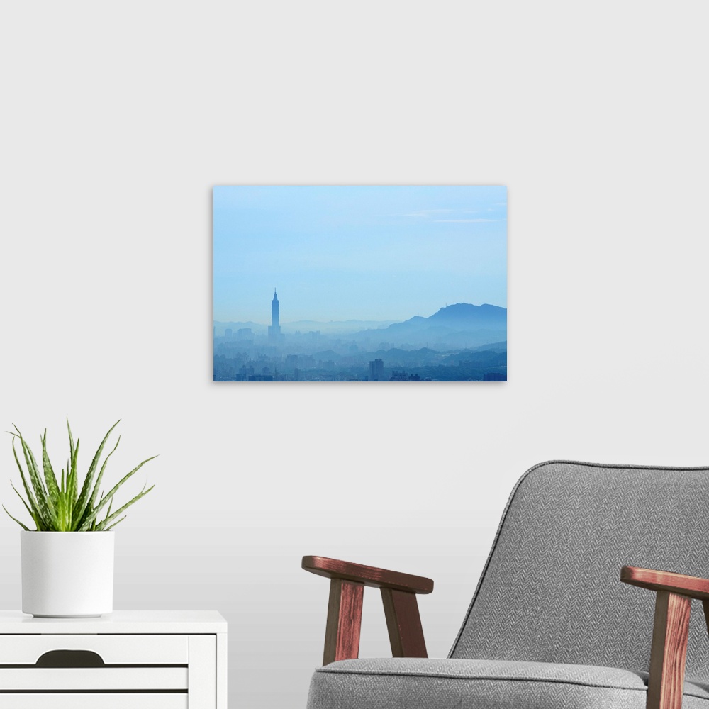 A modern room featuring Taipei in morning fog