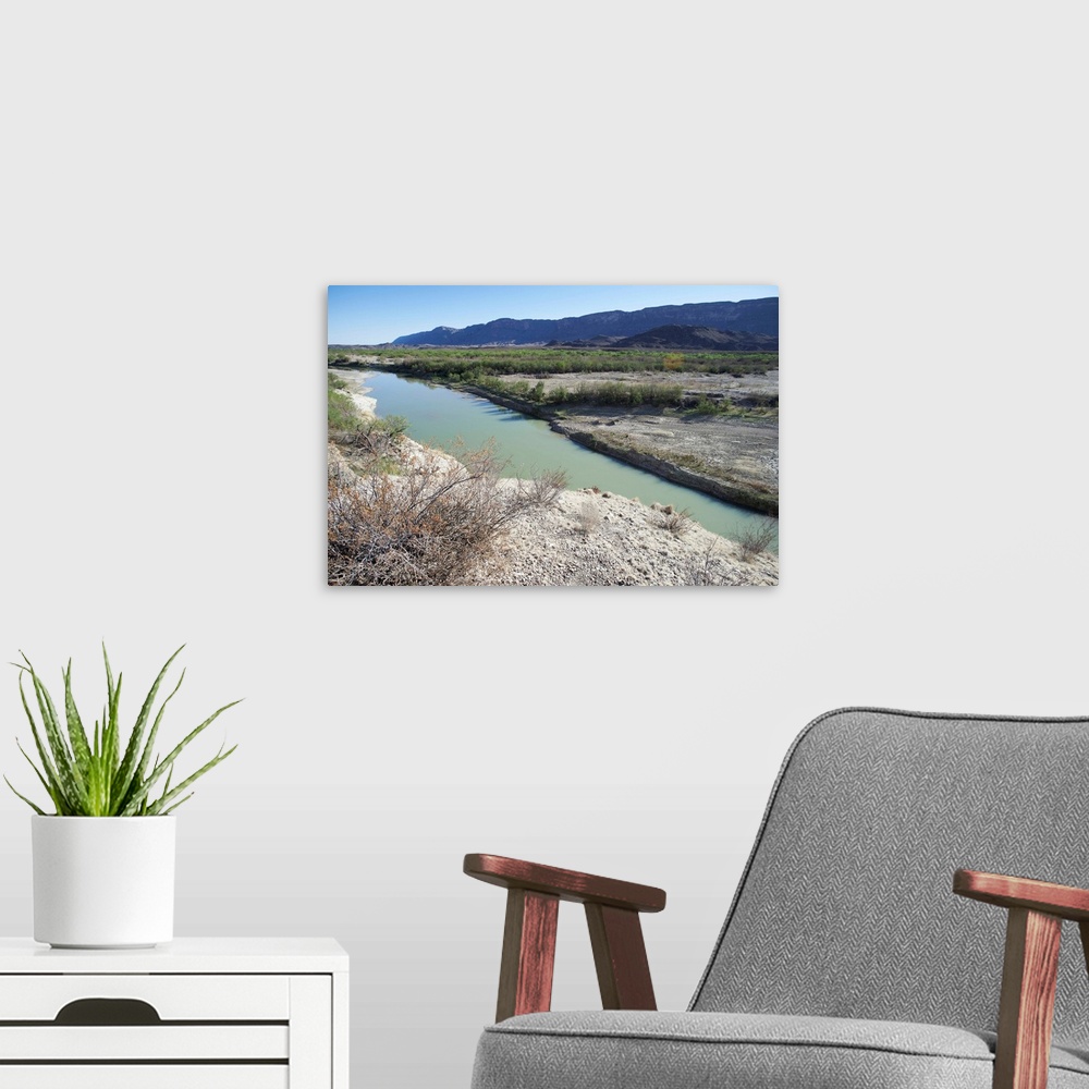 A modern room featuring The Rio Grande river serves as the border between the United States and Mexico at Big Bend Nation...