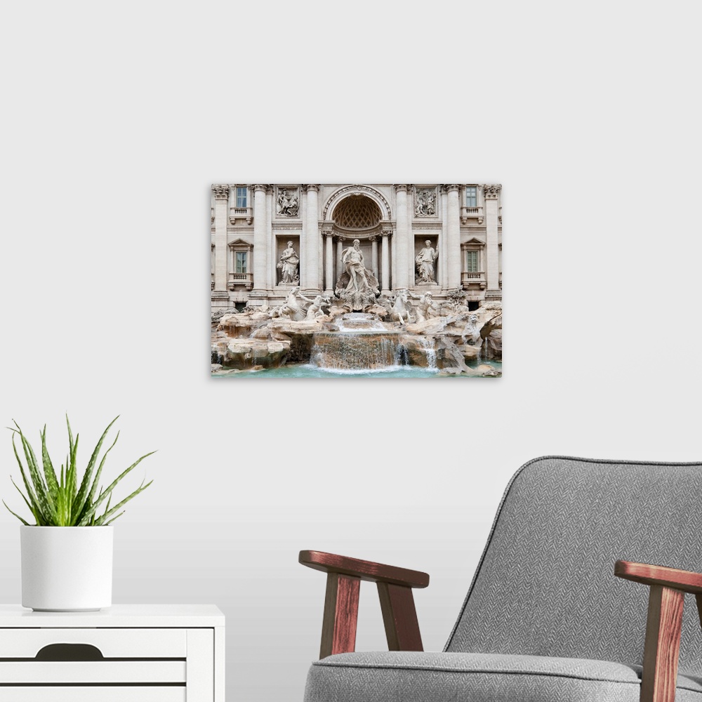 A modern room featuring The Trevi Fountain is a fountain in the Trevi rione in Rome, Italy. Standing 25.9 meters high and...