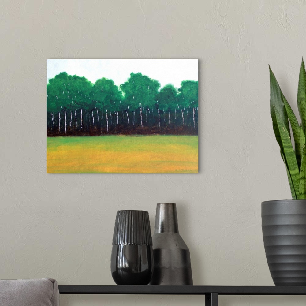 A modern room featuring Landscape painting of trees lining the edge of a forest next to an open field.