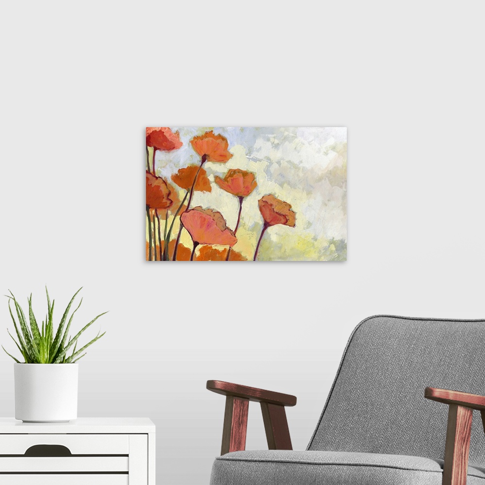 A modern room featuring Orange and peach colored flowers are painted against a soft yellowish background.