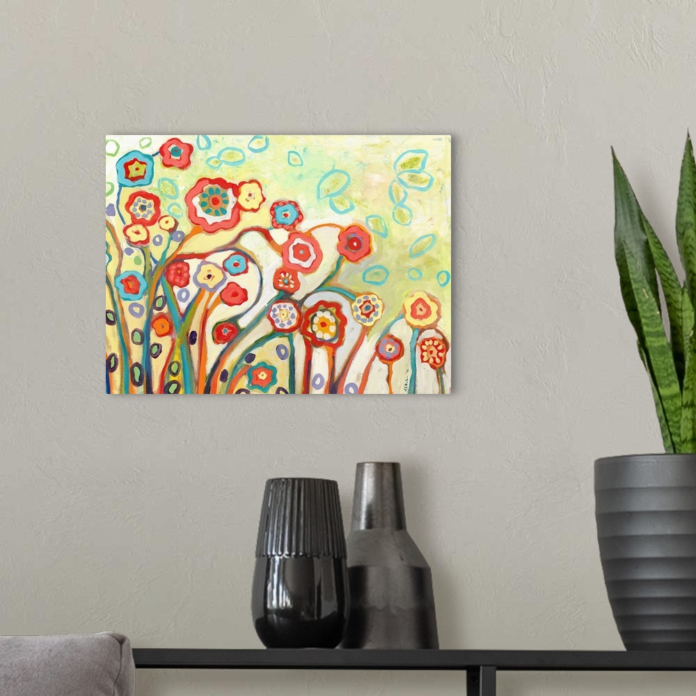 A modern room featuring This horizontal wall art features stylized flowers created with energetic brush strokes in an abs...