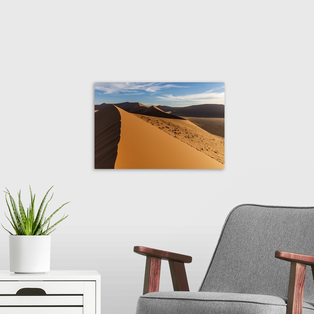 A modern room featuring Africa, Namibia. On top of Dune 45.