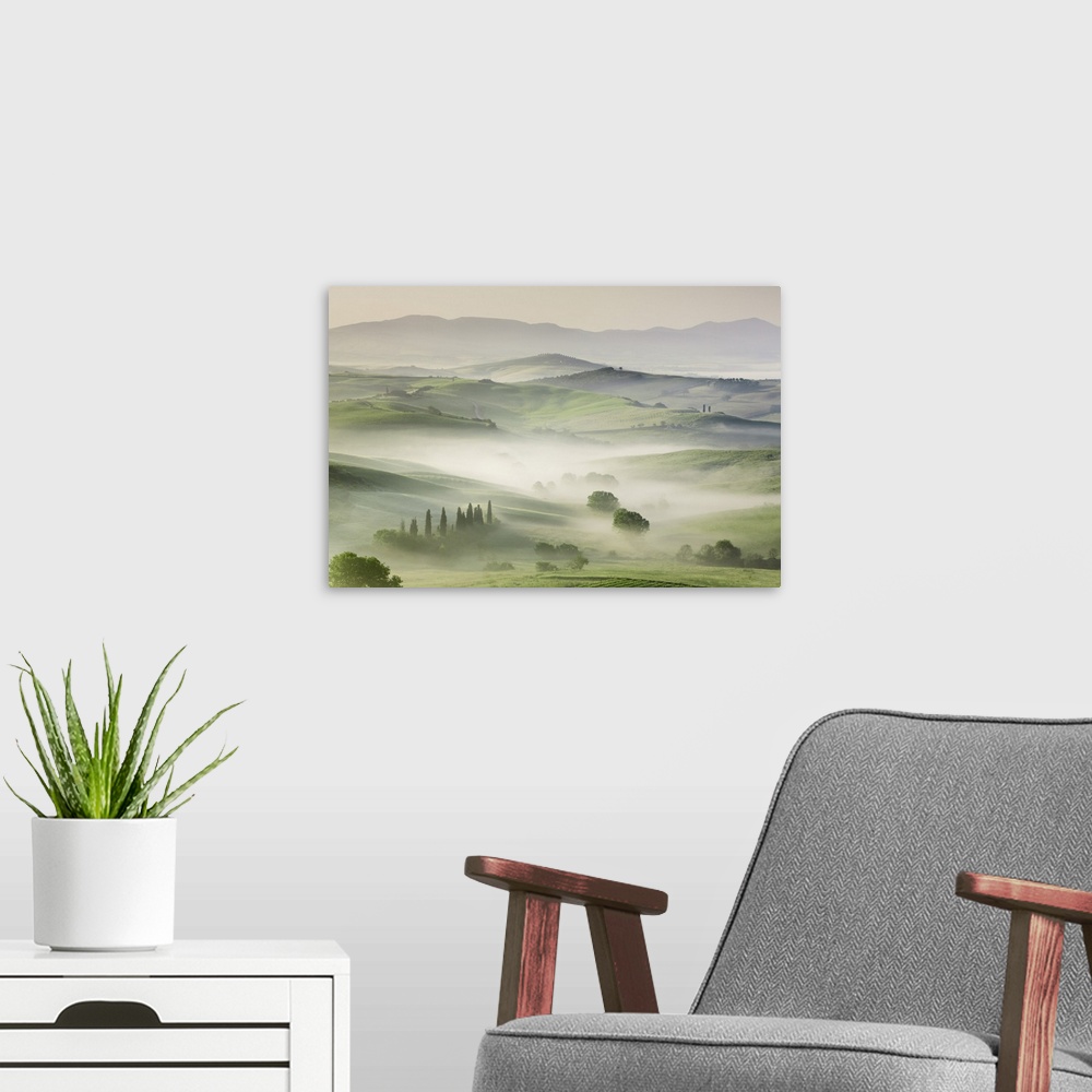 A modern room featuring Agricultural landscape in fog. Italy, Tuscany, Siena, Val d'Orcia, San Quirico d'Orcia. Tuscany, ...