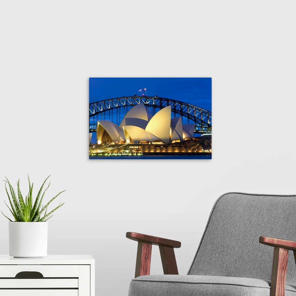 A modern room featuring Australia, Sydney, Opera House at dusk
