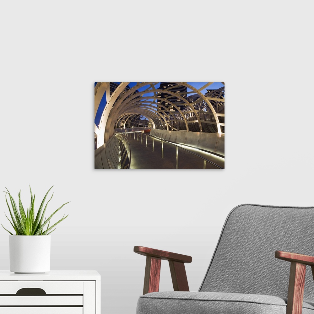 A modern room featuring Australia, Victoria, Melbourne, Docklands. The Webb Dock Bridge at night, its design inspired by ...