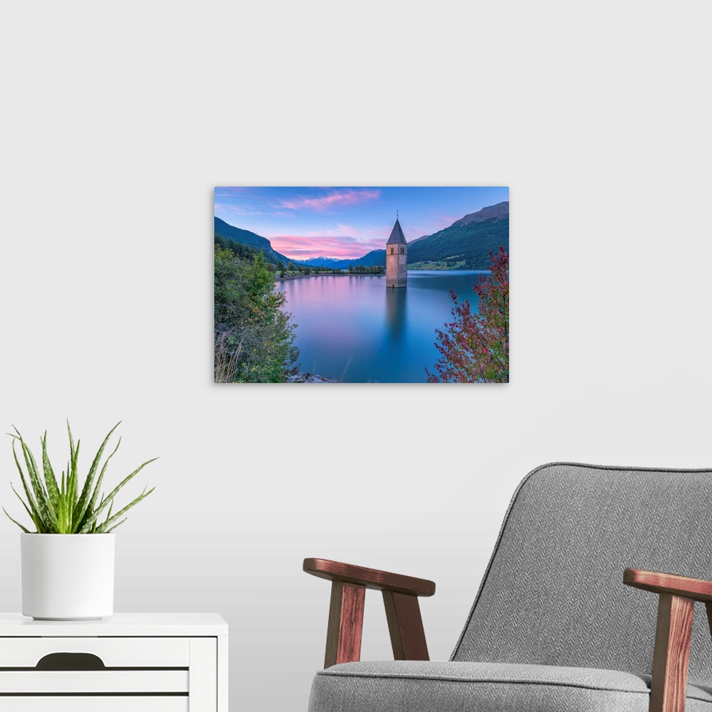 A modern room featuring Bell tower submerged of Resia lake at sunrise-Europe, Italy, Trentino Alto Adige, South Tyrol, Cu...