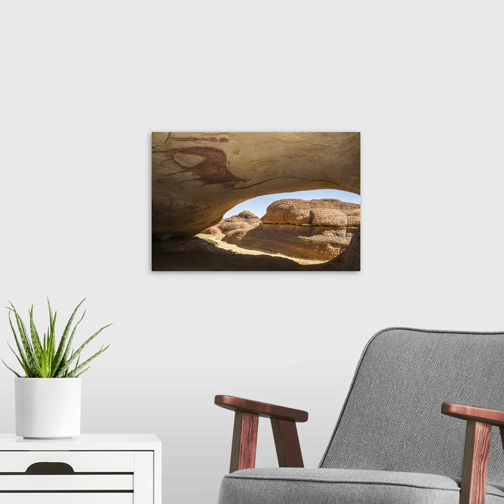 A modern room featuring Chad, Terkei East, Ennedi, Sahara. A huge painting of cows and human figures on the ceiling of a ...