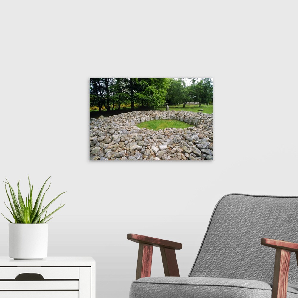A modern room featuring Clava Cairns, Culloden, Ross and Cromarty, Scotland. These mounds of stone surrounded by stone ri...