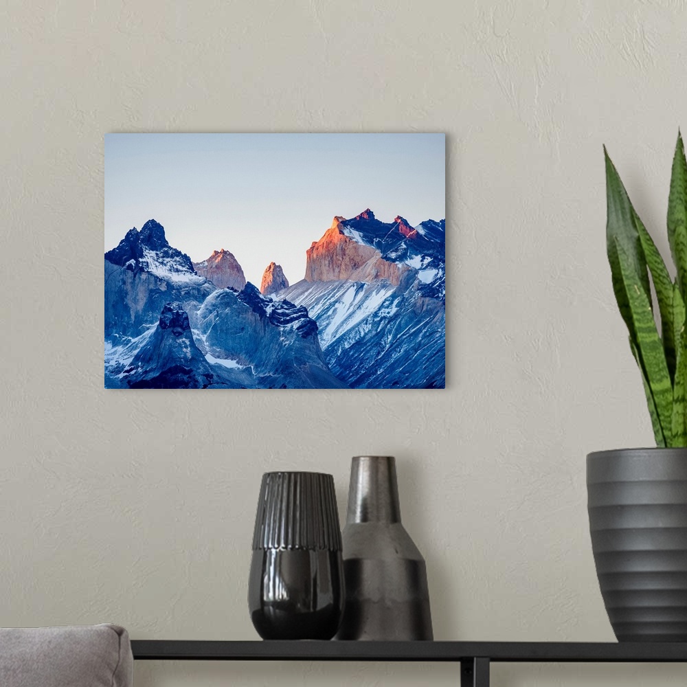 A modern room featuring Cuernos del Paine and Mount Almirante Nieto at sunset, Torres del Paine National Park, Patagonia,...