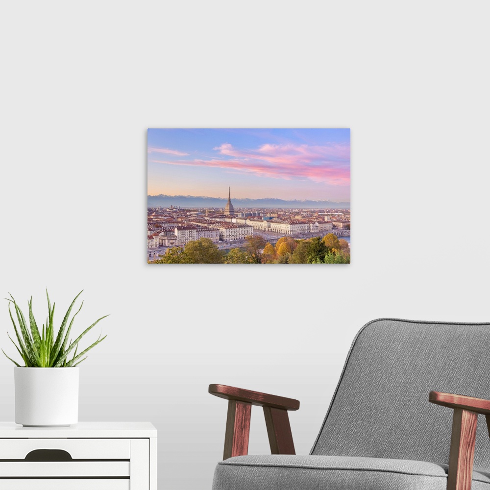 A modern room featuring Elevated view of old town of Turin (Torino) at sunset. Piemonte region, Italy, Europe.