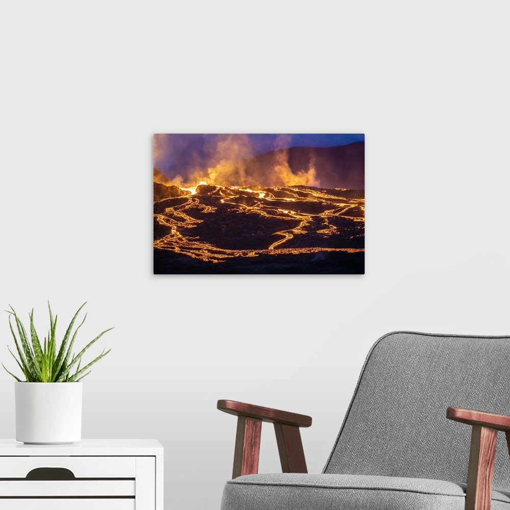 A modern room featuring Fagradalsfjall volcano eruption at night, Geldingadalir, Reykjanes Peninsula, Iceland.