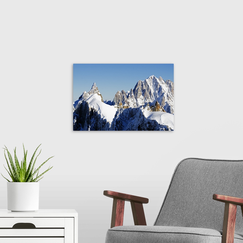 A modern room featuring Europe, France, French Alps, Haute-Savoie, Chamonix, view of Aiguilles du Dru from Aiguille du Midi.