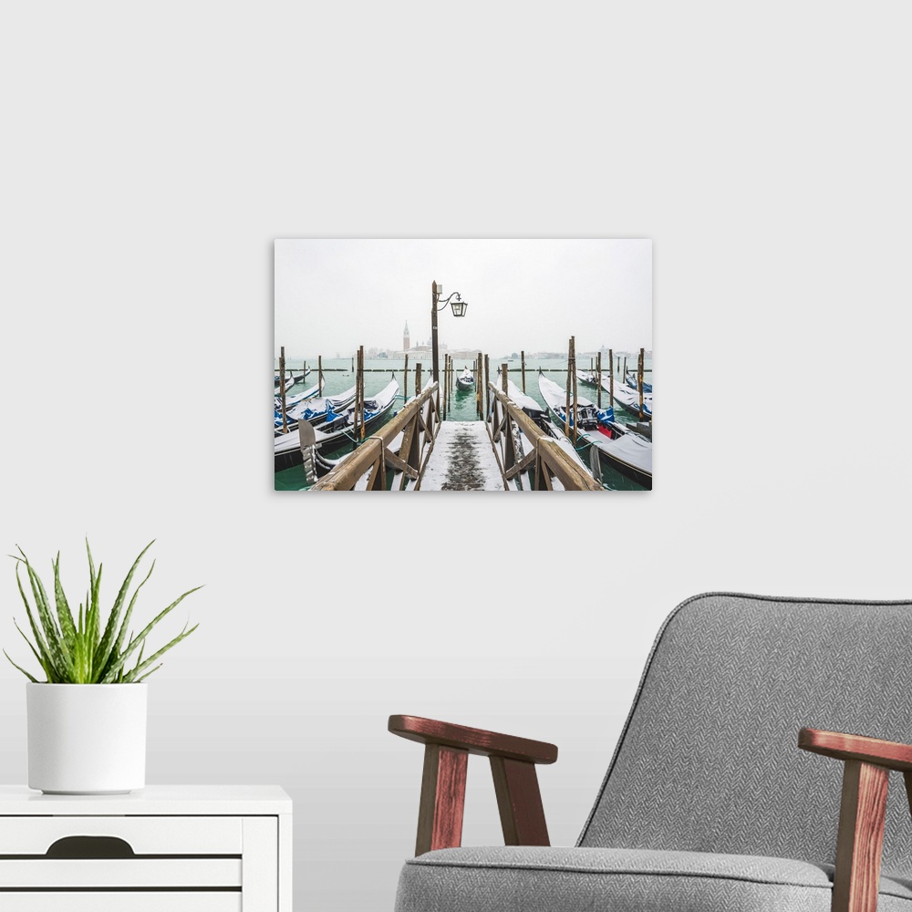 A modern room featuring Gondolas With Snow At St Mark's Waterfront, Venice, Veneto, Italy.