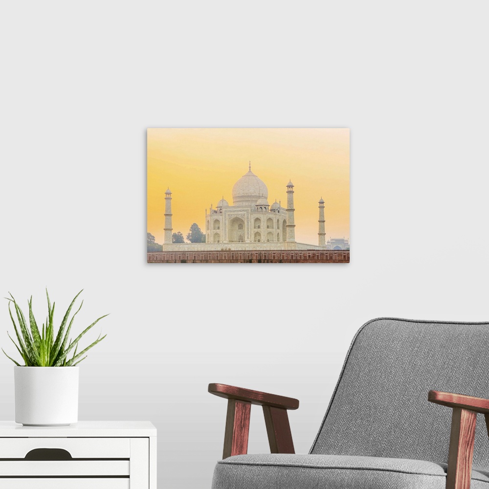A modern room featuring India, Uttar Pradesh, Agra, Taj Mahal in golden dawn light