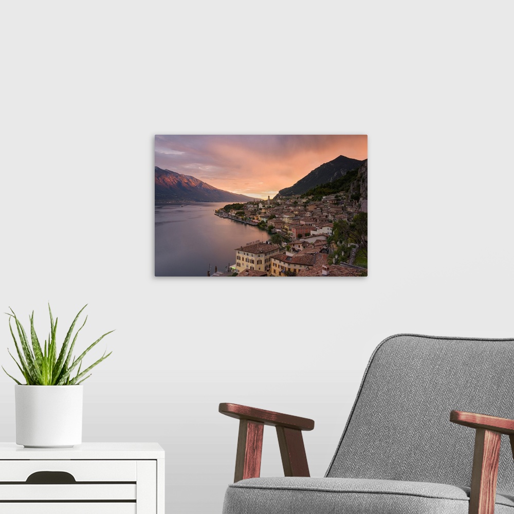 A modern room featuring Limone sul Garda at sunset, Garda lake, Brescia province, Lombardy district, Italy, Europe.