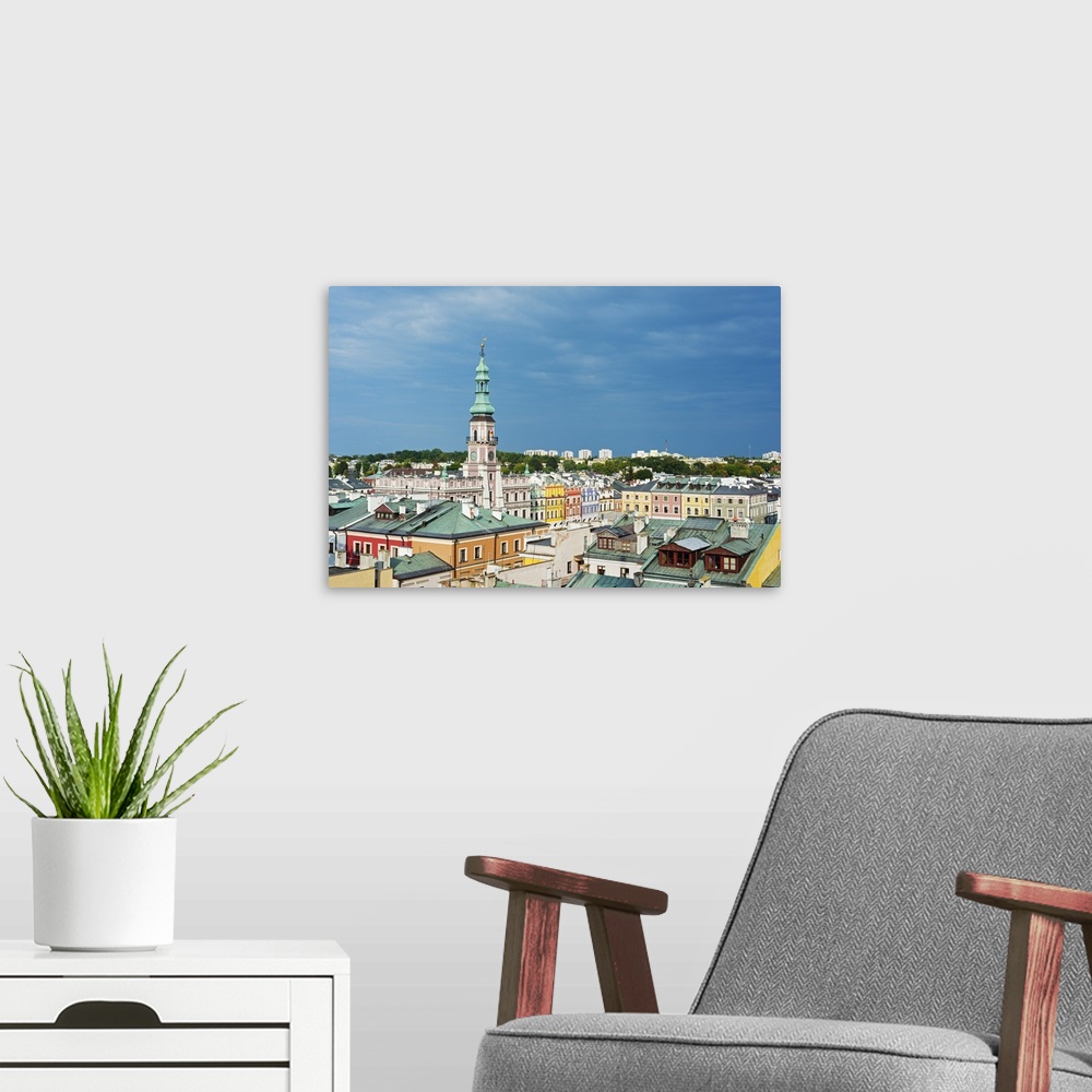 A modern room featuring Europe, Poland, Zamosc, Rynek Wielki, old town square, town hall, UNESCO.