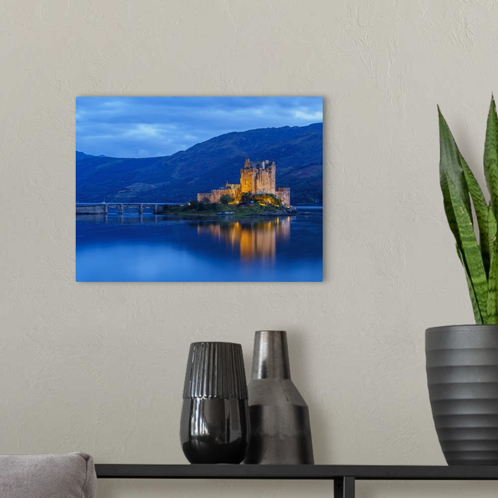 A modern room featuring UK, Scotland, Highlands, Dornie, Twilight view of the Eilean Donan Castle.