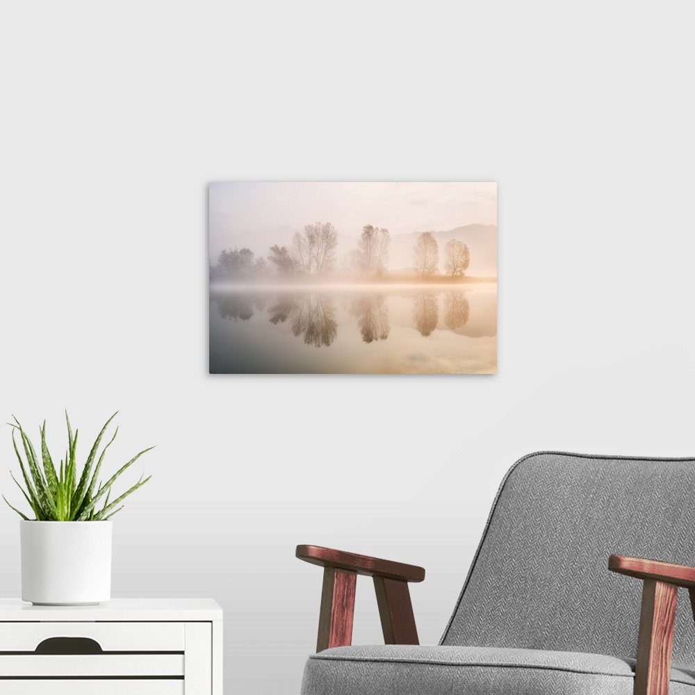 A modern room featuring Sunrise in Adda river, Airuno province, Lombardy district, Italy, Europe.