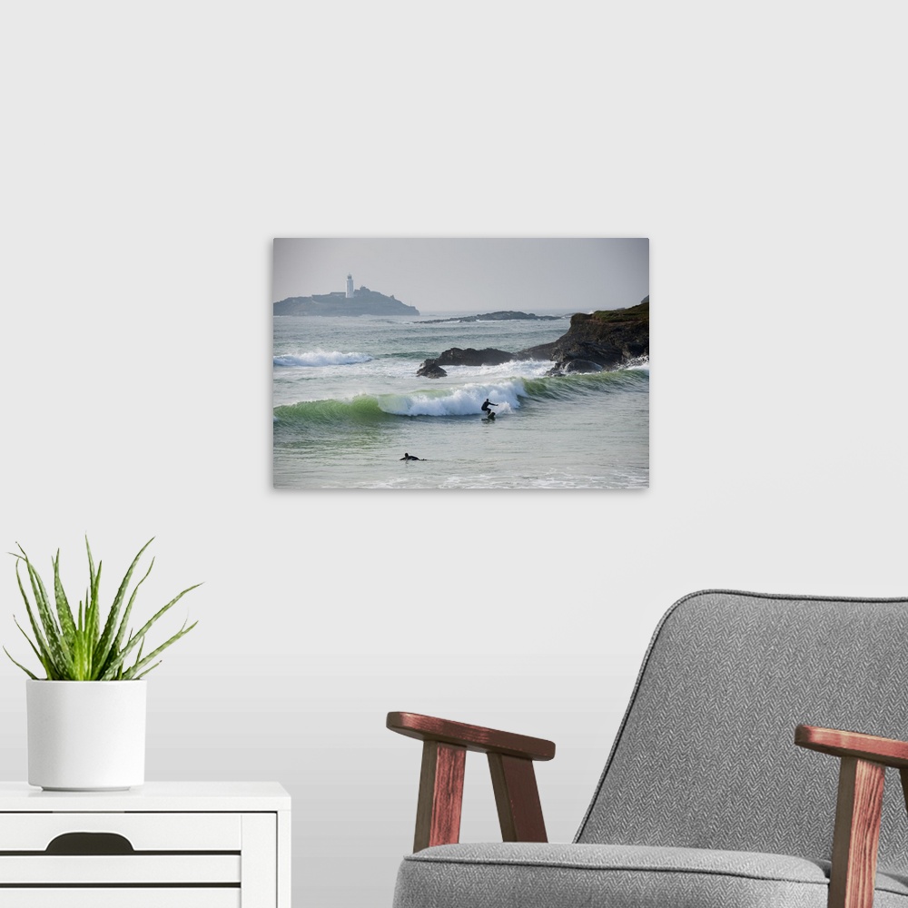 A modern room featuring Surfers, St Ives Bay, Cornwall, England.