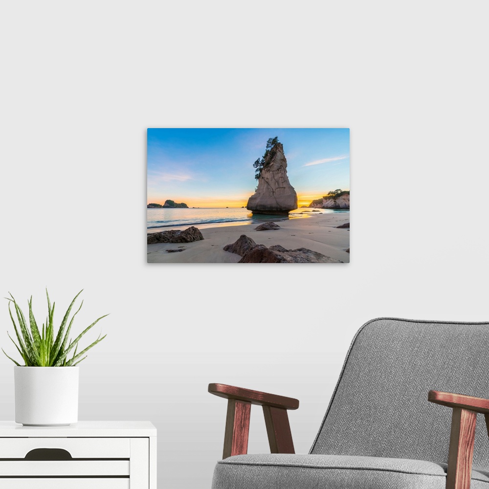 A modern room featuring Te Hoho rock at Cathedral Cove at sunrise. Hahei, Waikato region, North Island, New Zealand.