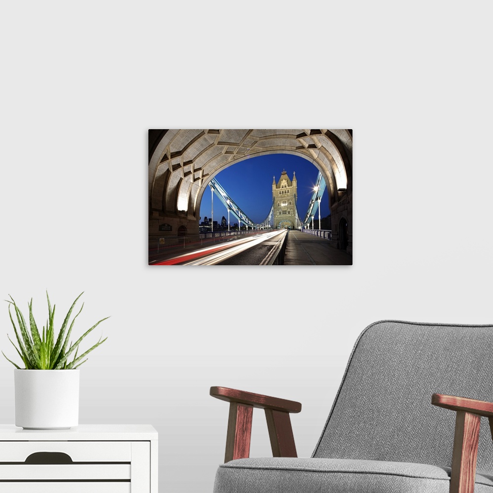 A modern room featuring The famous Tower Bridge over the River Thames in London.