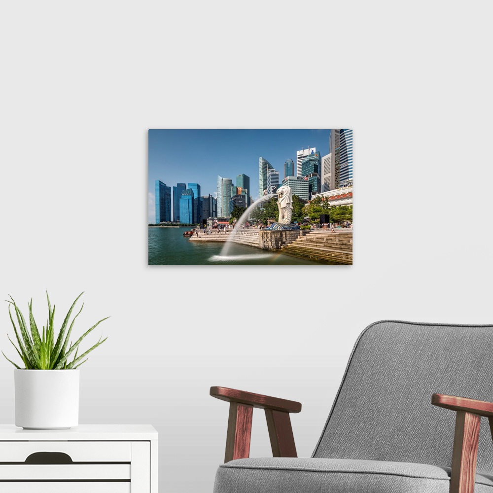 A modern room featuring The Merlion statue with city skyline in the background, Marina Bay, Singapore.