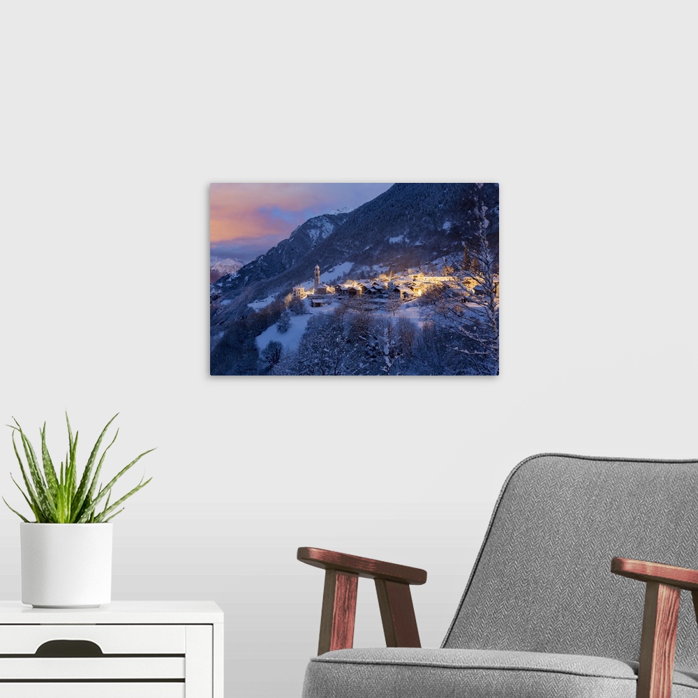 A modern room featuring The village of Soglio by night after a heavy snowfall, val Bregaglia, Grisons, Switzerland.