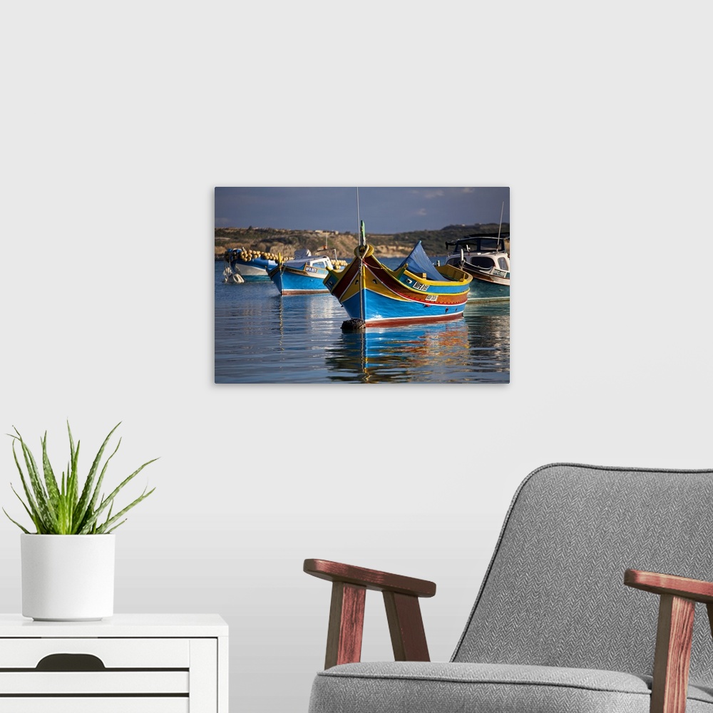 A modern room featuring Malta, Europe, Colourful traditional Maltese boats known locally as 'luzzu' in the village of Mar...