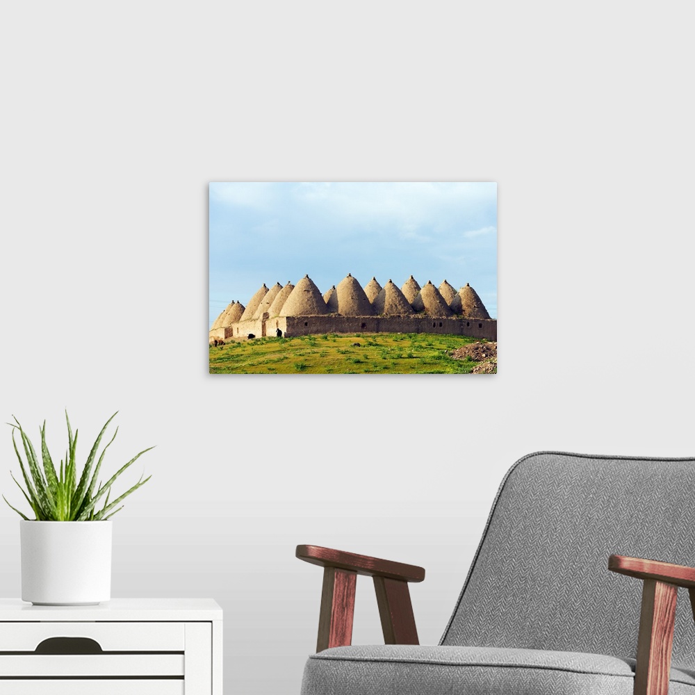 A modern room featuring Turkey, Eastern Anatolia, village of Harran, beehive mud brick houses.