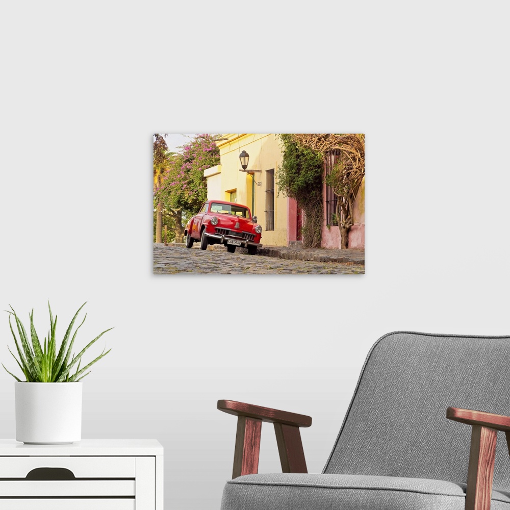 A modern room featuring Uruguay, Colonia Department, Colonia del Sacramento, Vintage Studebaker car on the cobblestone la...
