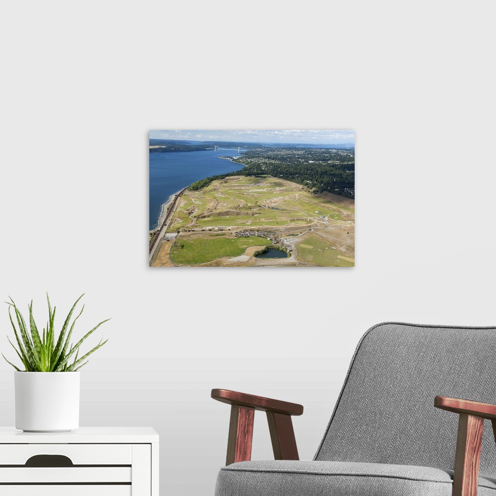 A modern room featuring aerial view of Chambers Bay Golf Course, site of the 2015 US Open Championship; University Place,...