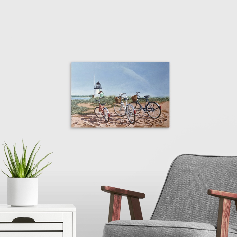 A modern room featuring Three bicycles on a beach with a lighthouse.