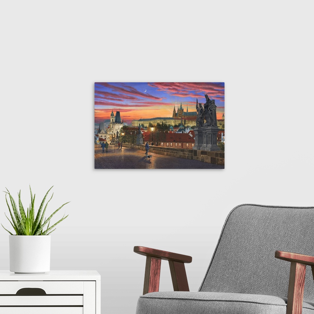 A modern room featuring Contemporary artwork of an old European city at night with people walking on a bridge in the fore...