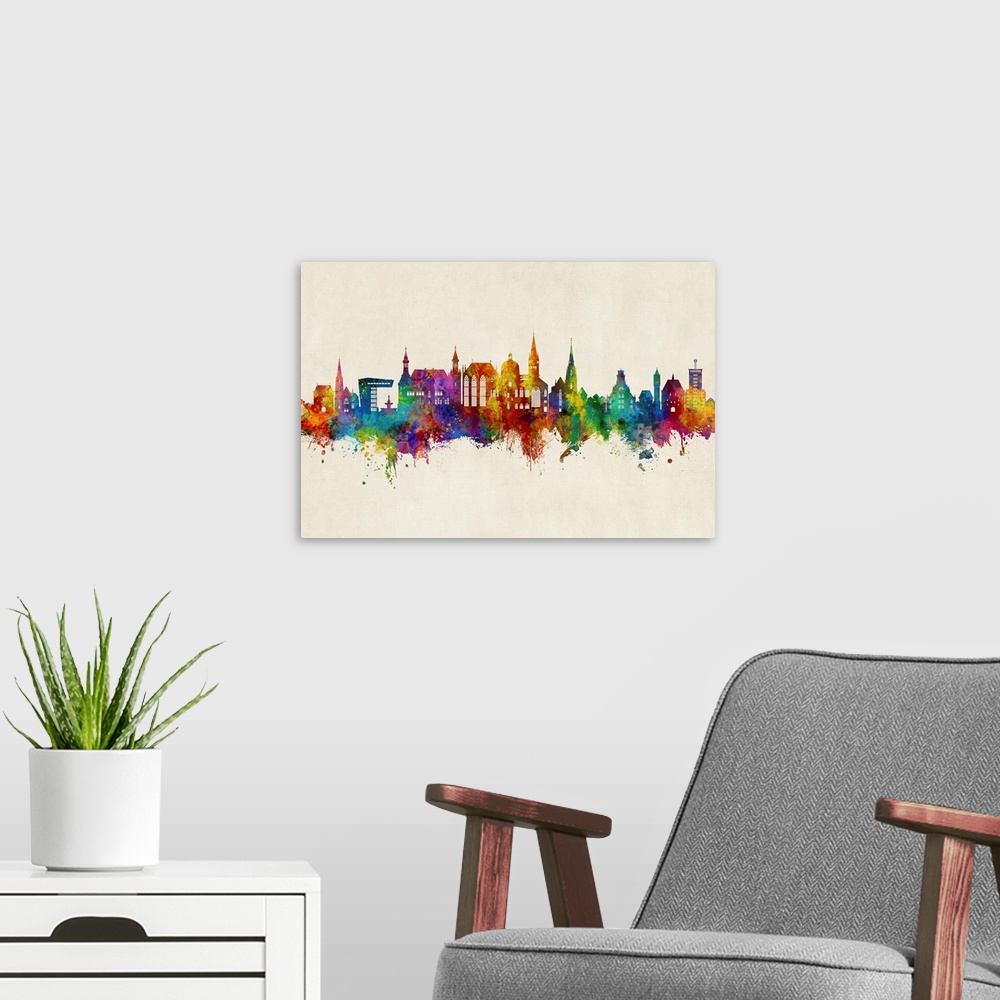 A modern room featuring Watercolor art print of the skyline of Aachen, Germany
