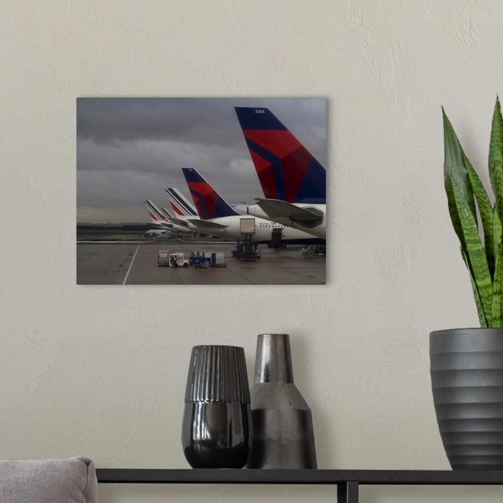 A modern room featuring Row of Planes on a Tarmac