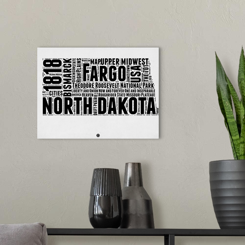 A modern room featuring Black and white art map of the US state  North Dakota.