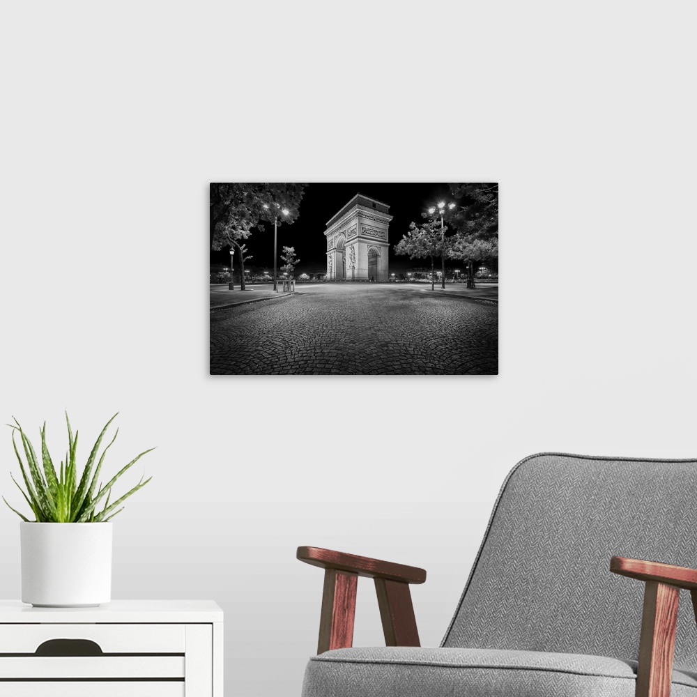 A modern room featuring Fine art photo of the Arc de Triomphe, a landmark on the Champs Elysees in Paris.