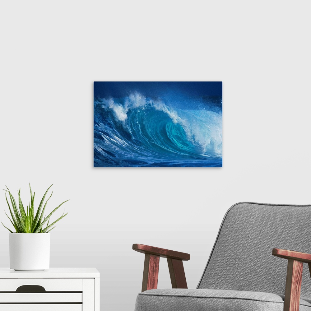 A modern room featuring A close up horizontal photograph of a curling wave. During late November through mid-January, the...