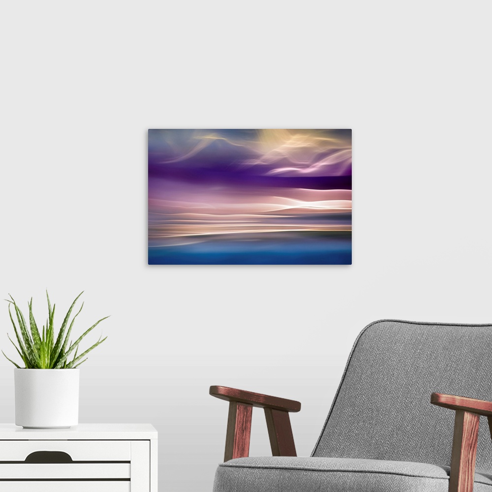 A modern room featuring Abstract photograph with beams of light resembling mountains, in shades of pink and blue.