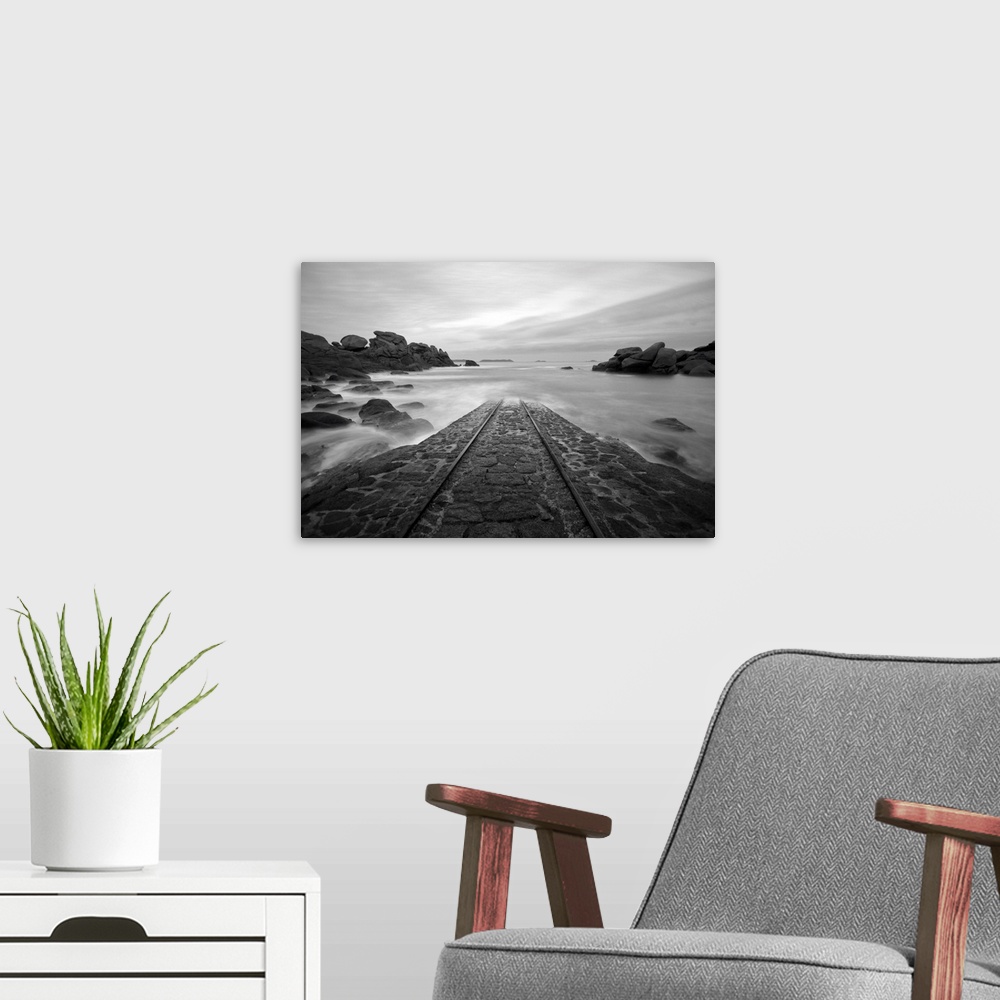 A modern room featuring A place in Brittany called, SNSM, road for boats going into the sea, in black and white.