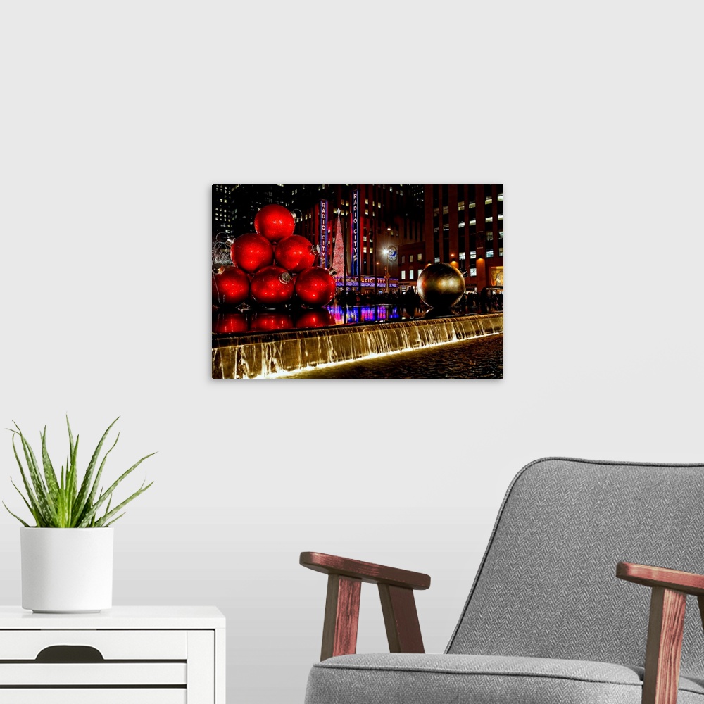 A modern room featuring Radio City Music Hall night view with Christmas Decorations, New York City, New York.