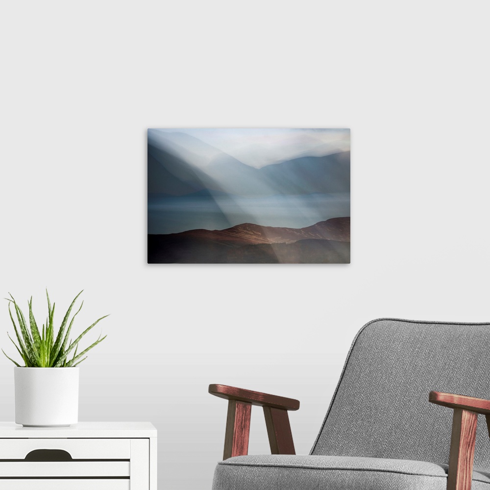A modern room featuring Dreamy landscape photograph of Loch Morlich in Scotland with rolling hills in the background and ...