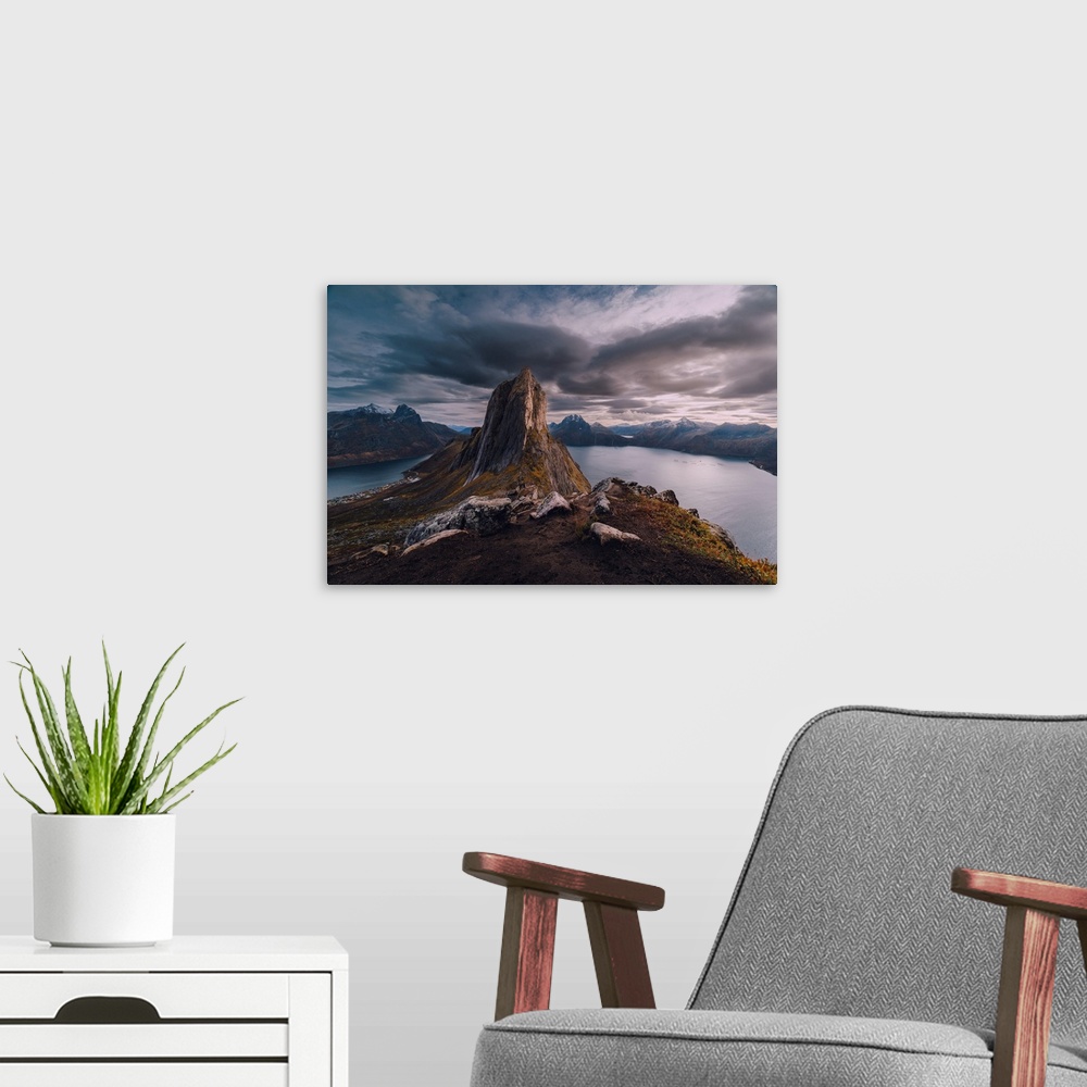 A modern room featuring Segla, the most iconic mountain peak in Senja, the second largest island in Norway.
