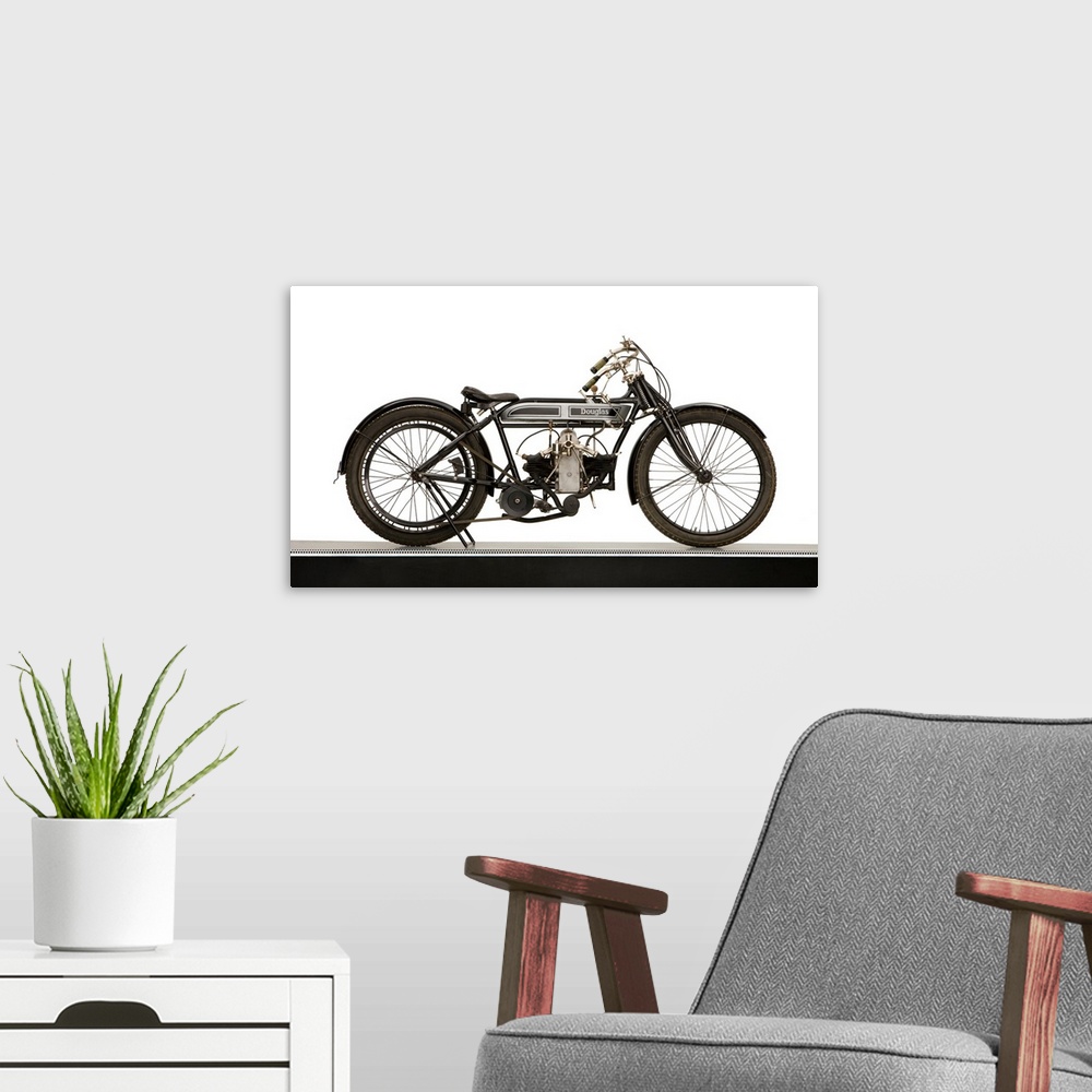 A modern room featuring 1918 Douglas 2 3/4 hp motorcycle country of origin United Kingdom.