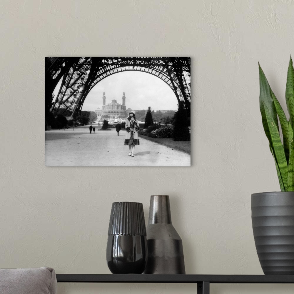 A modern room featuring 1920's Woman Walking Under The Eiffel Tower With The Trocadero In Background Paris France.